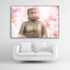 Tysta Akustikbild Asien Buddha mit Buddhastatue und rosa Kirschblüten. Schwarzer Bilderrahmen im Querformat 3 zu 2 über weißem Sofa.