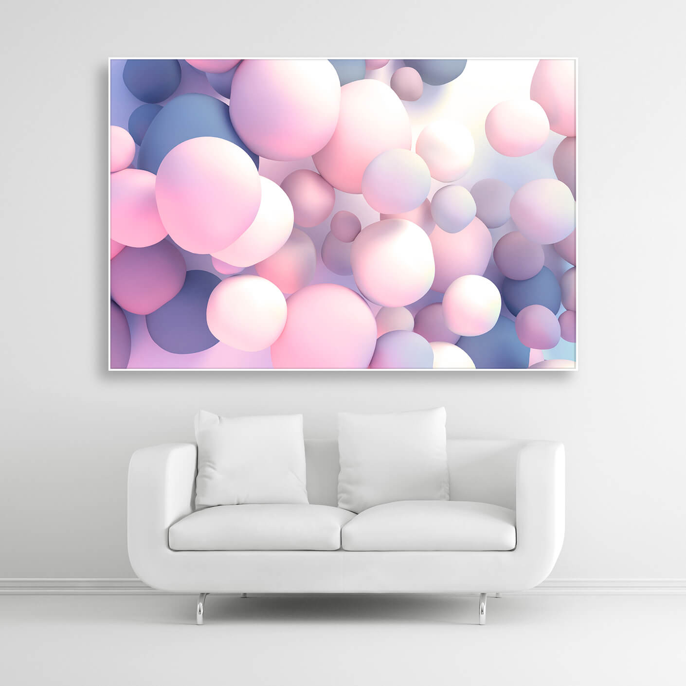 Schallschutzbild mit rosa-blau pastellfarbenden Ballons in unterschiedlicher Größe frei schwebend. Weißer Bilderrahmen im Querformat 3 zu 2 über weißem Sofa.