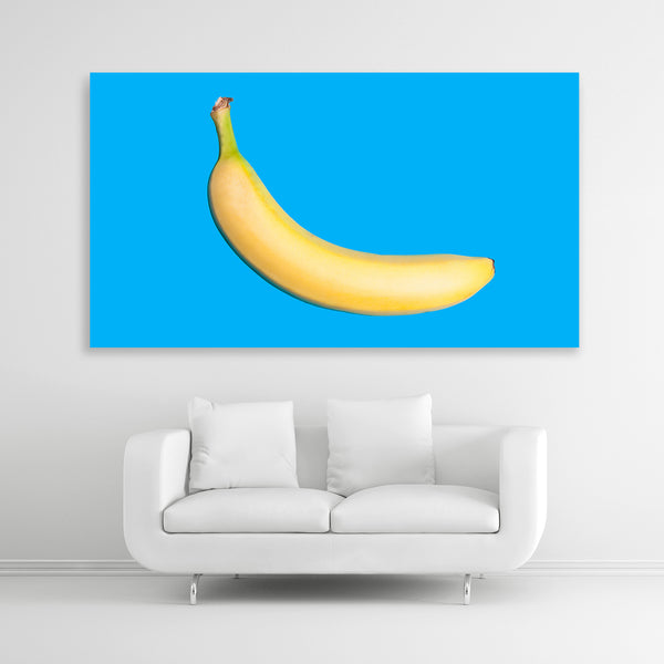 Pop-Art-Druck einer einzelnen Banane auf leuchtendem Blau. Bildformat 160x90cm.